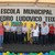 Prefeito Fernandes Martins (Esq. Vermelho) e autoridades durante inauguração da nova escola
